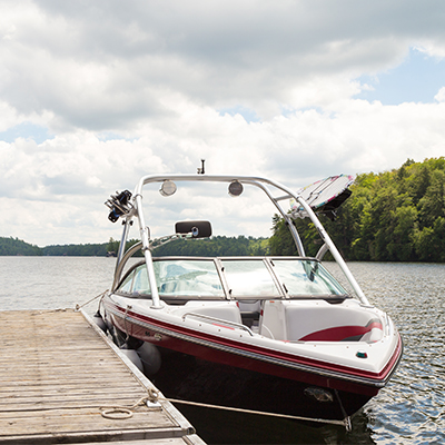 Speedboat tied at dock